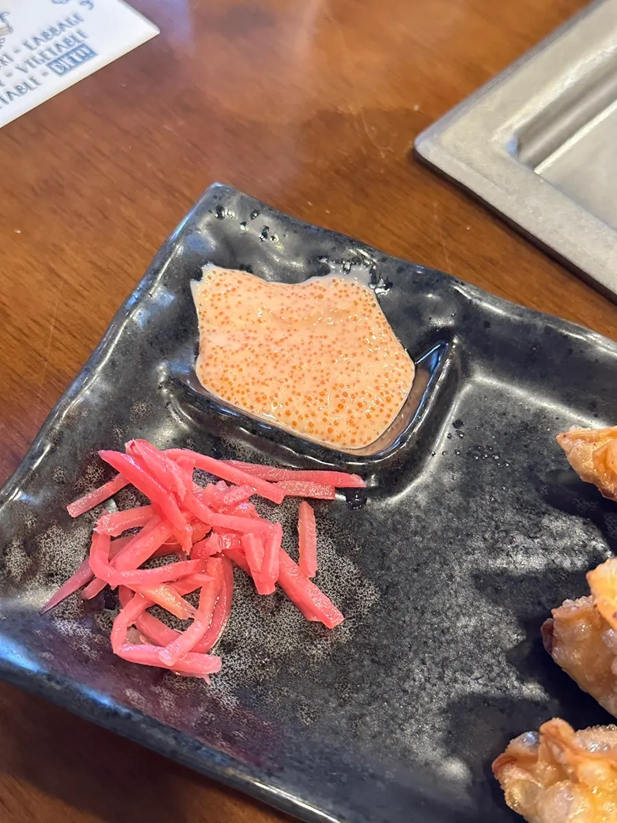Close-up of golden fried mentaiko gyoza