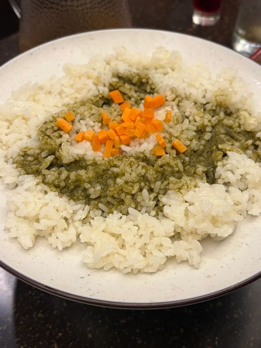 A bowl of kalguksu served with the broth