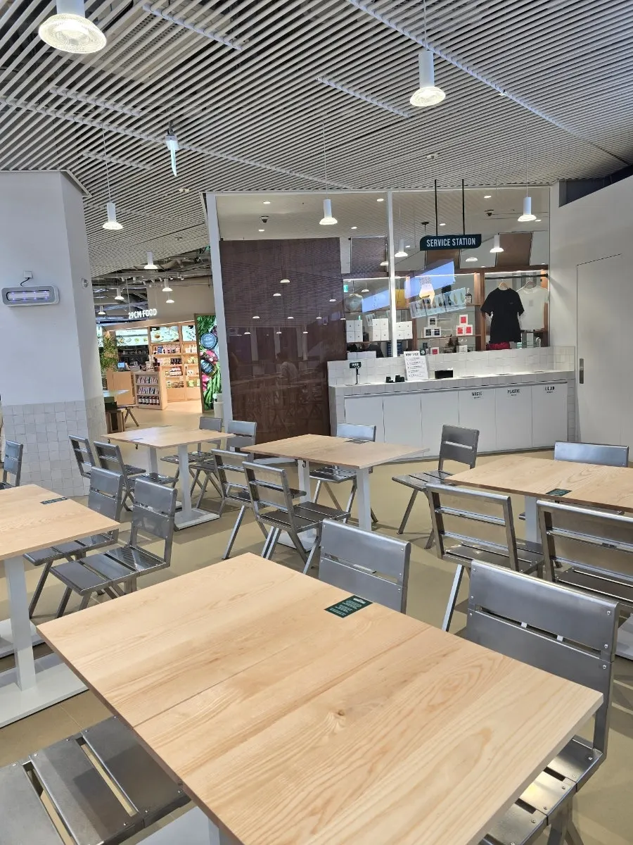 Seating and tables at the Dwaeji Gomtang House pop-up