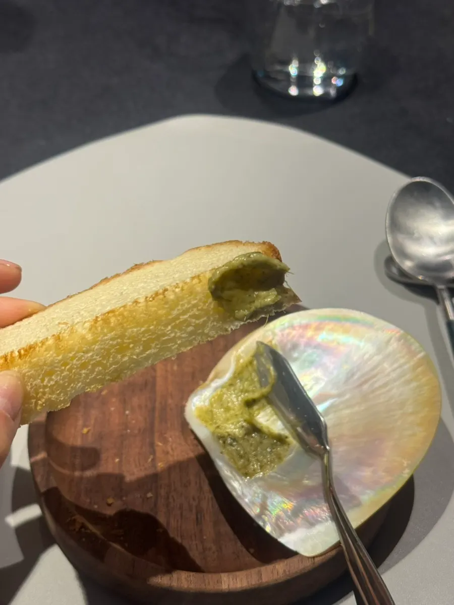 Kelp soy sauce butter served in a shell