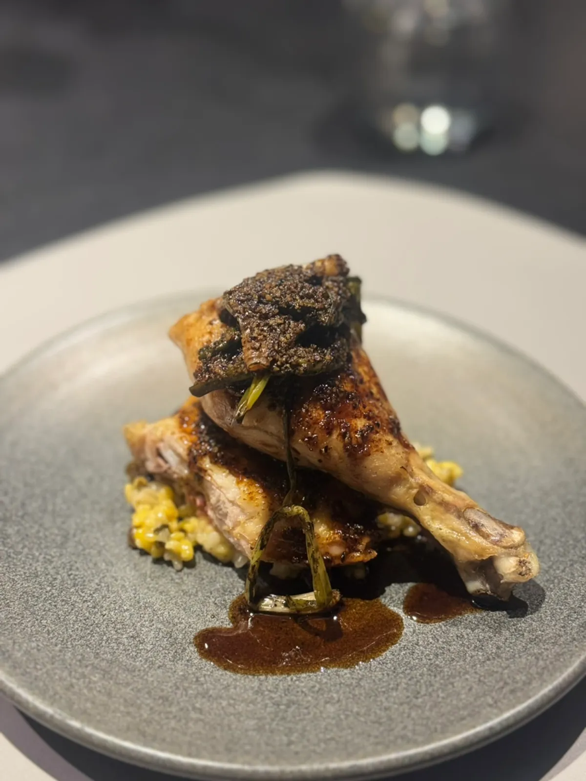Grilled chicken leg served with mung bean porridge