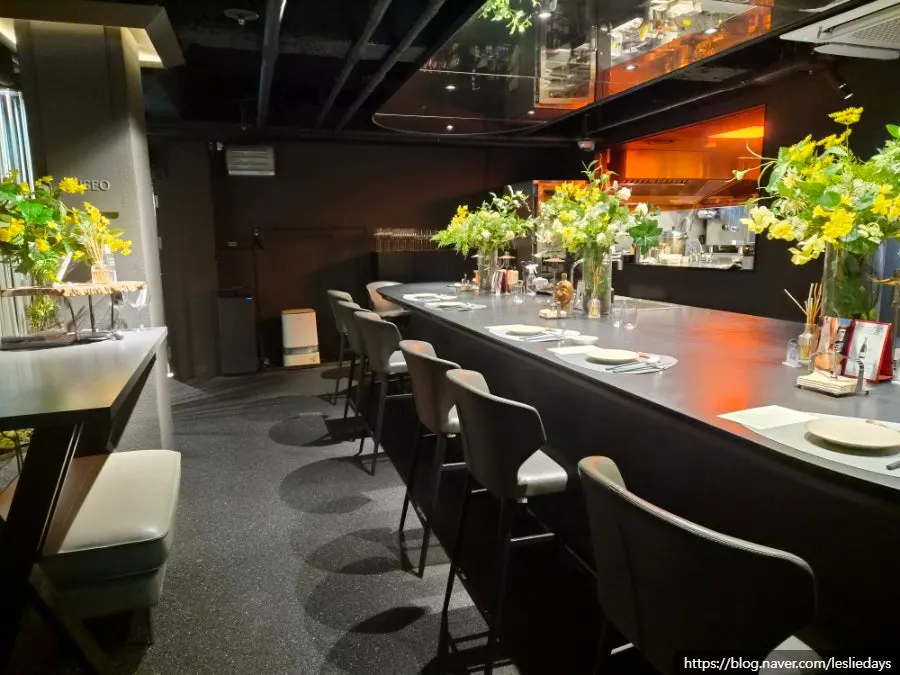 The calm basement-level dining space at MUSEO