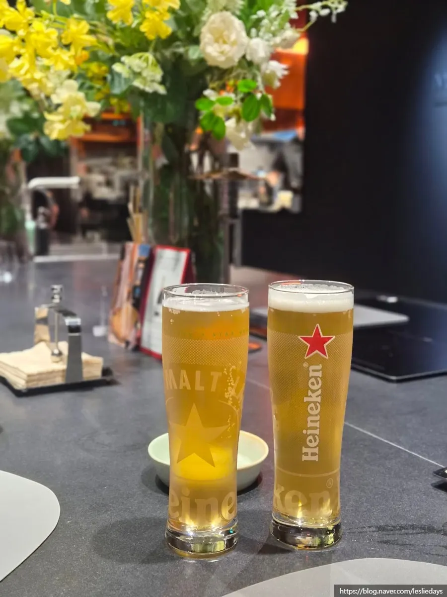 A glass of draft beer ordered per the dinner drink requirement