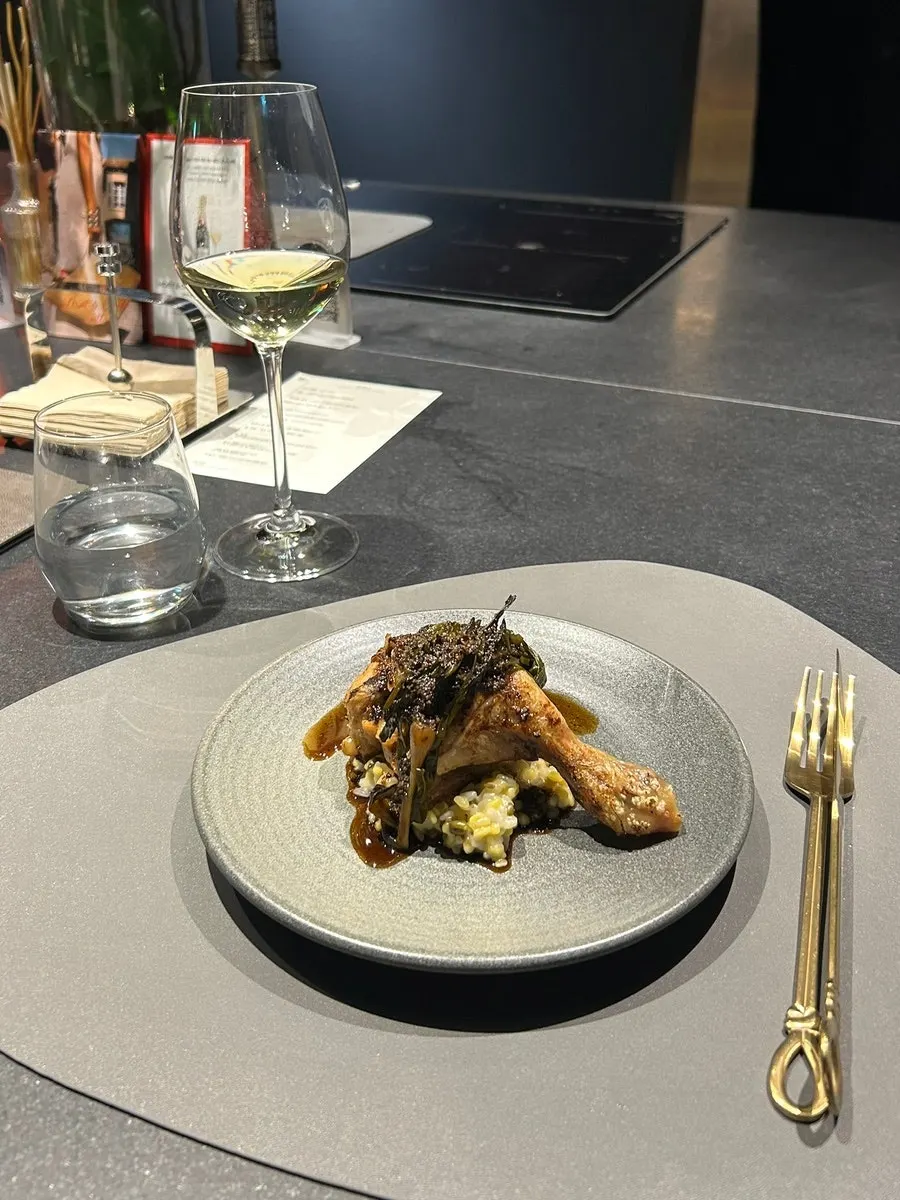 MUSEO's chicken leg main course served with mung bean porridge