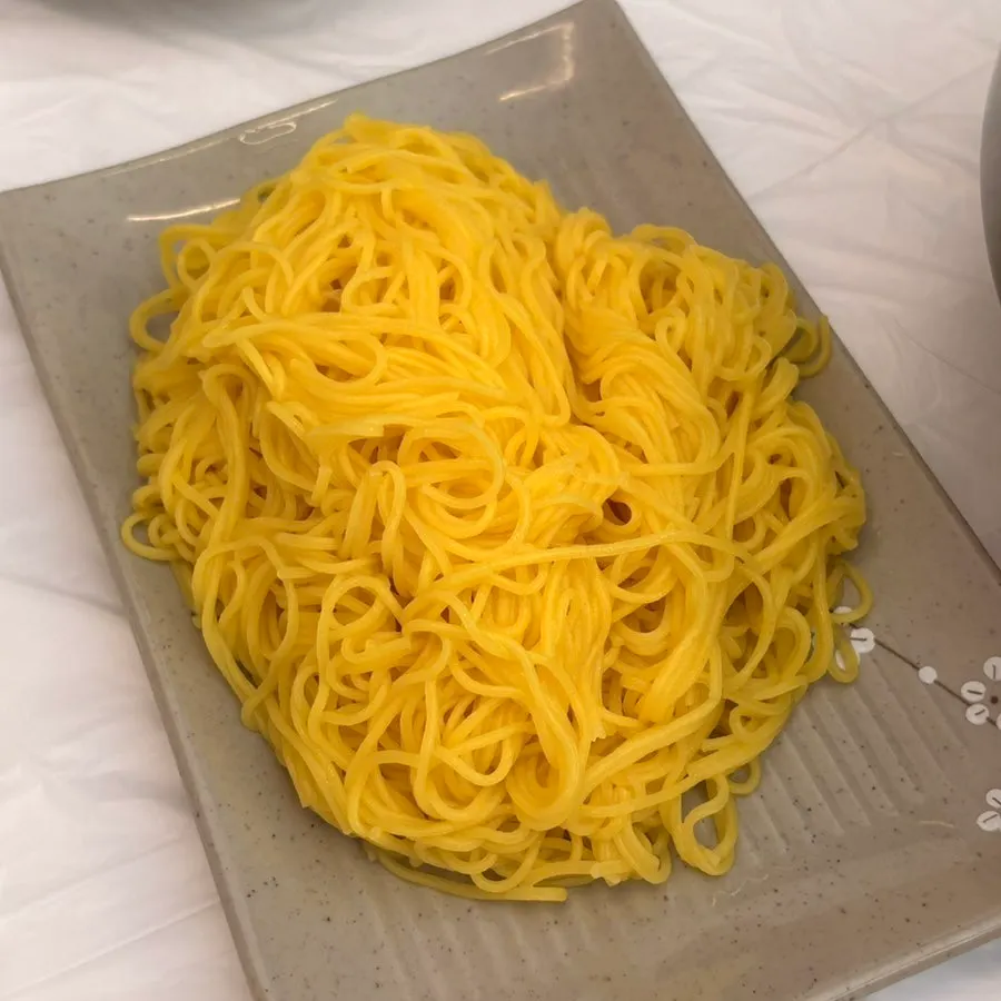 A bowl of mulhoe piled with seafood