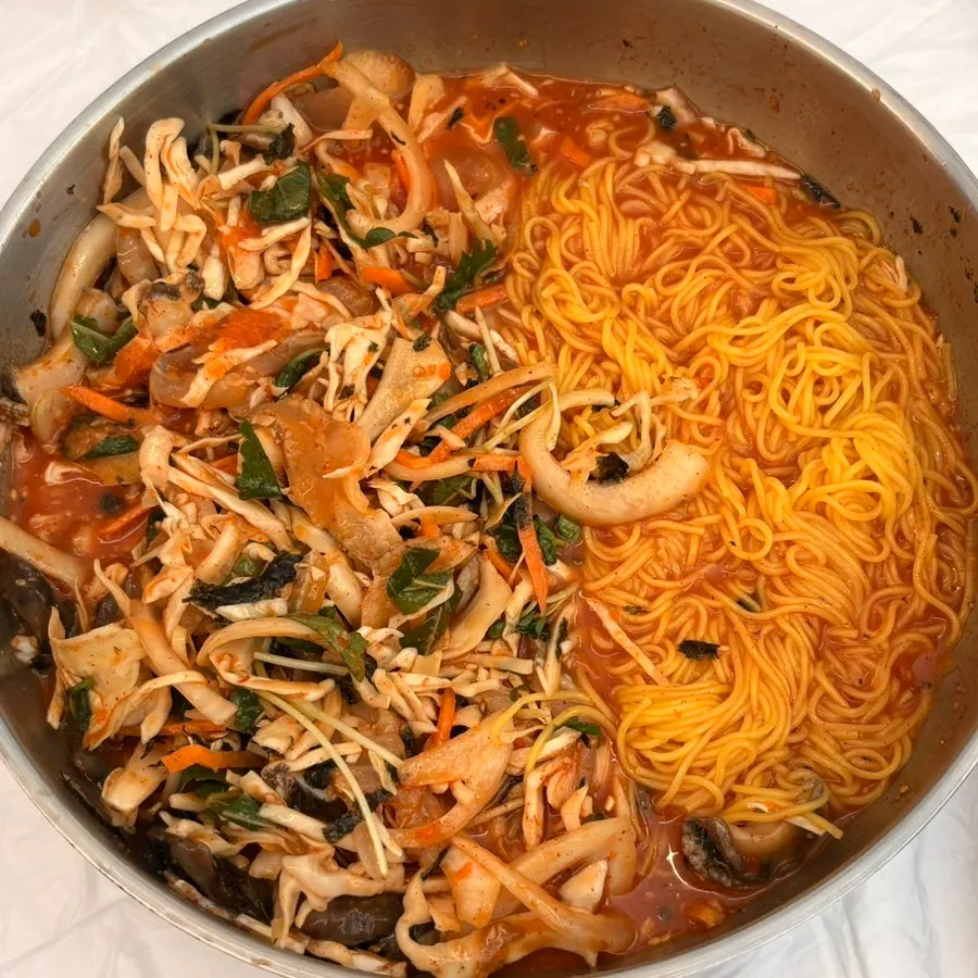 Corn noodles served alongside the mulhoe