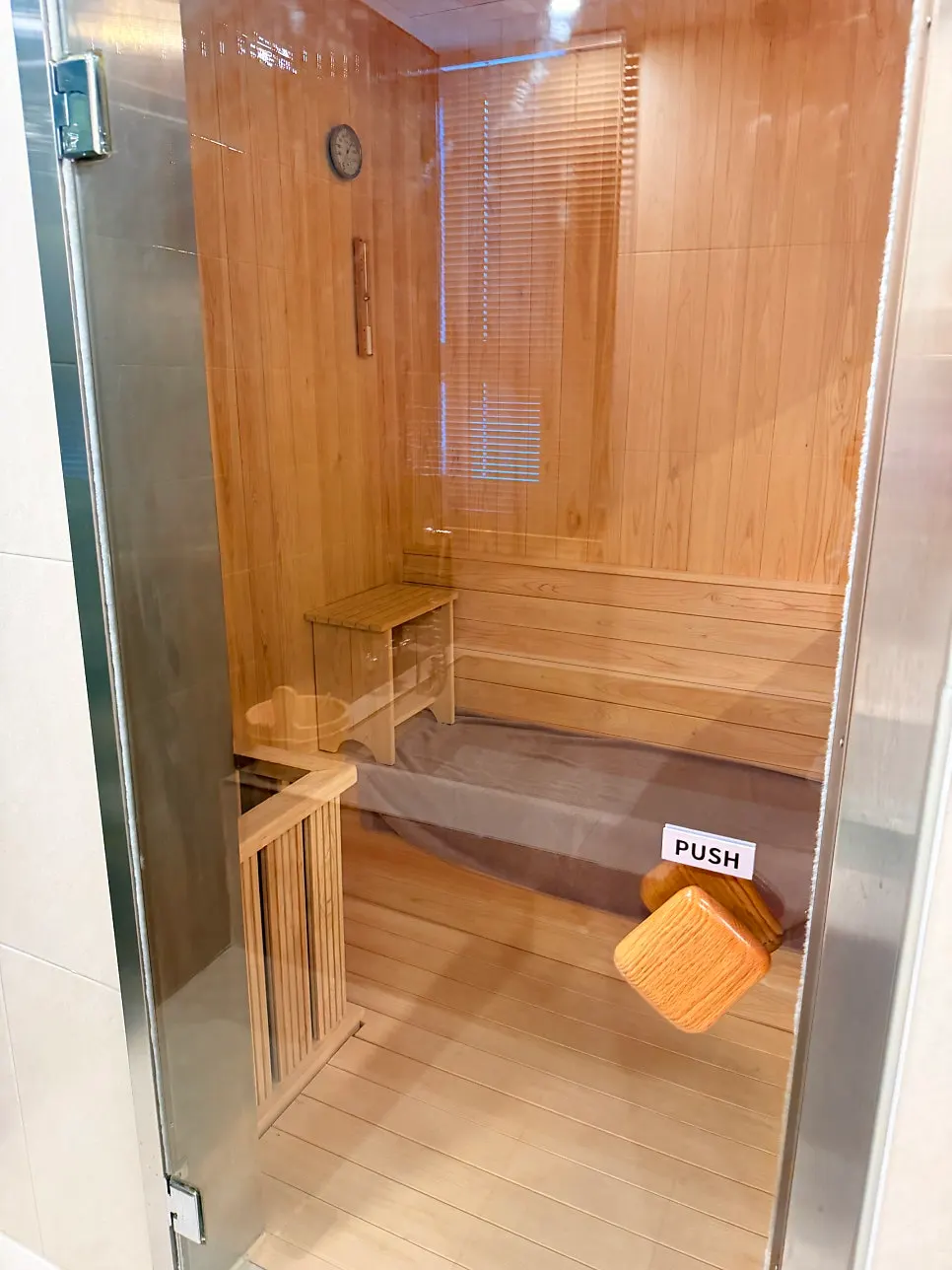 Half-body bath tub filled with warm water