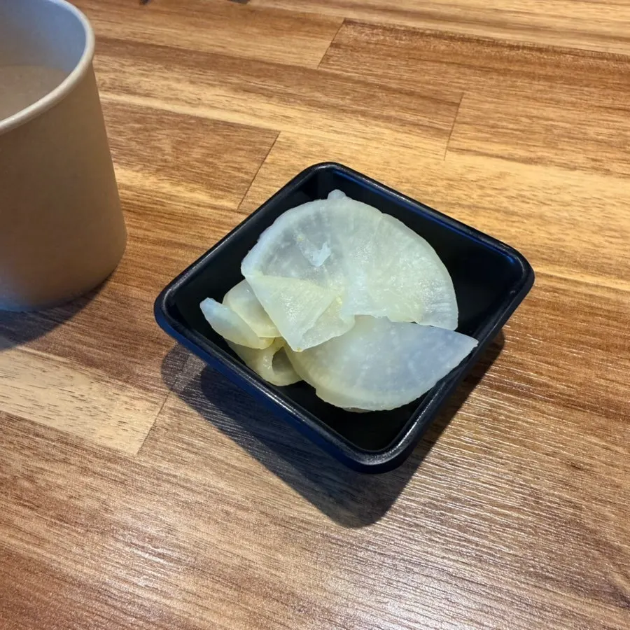 Black pepper and ice water set on the table