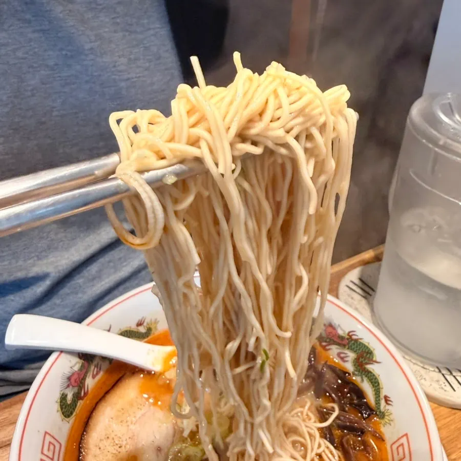 Thin meat topping inside the hangover ramen
