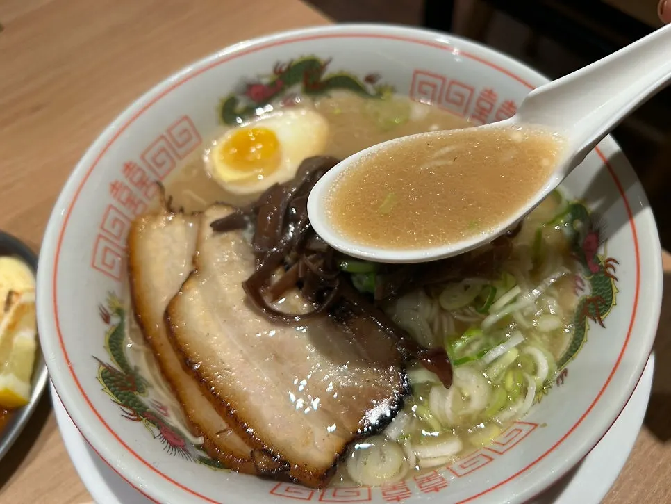 Spoonful of tonkotsu ramen broth