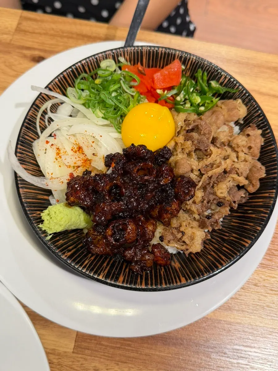 Hormone-don topped with egg yolk and cheongyang chili