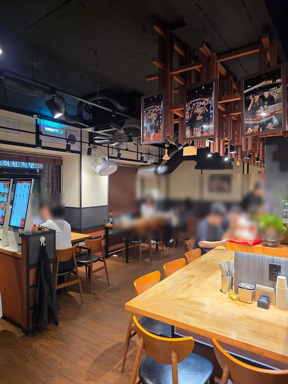 Basement table seating interior at Mentsuru City Hall Branch