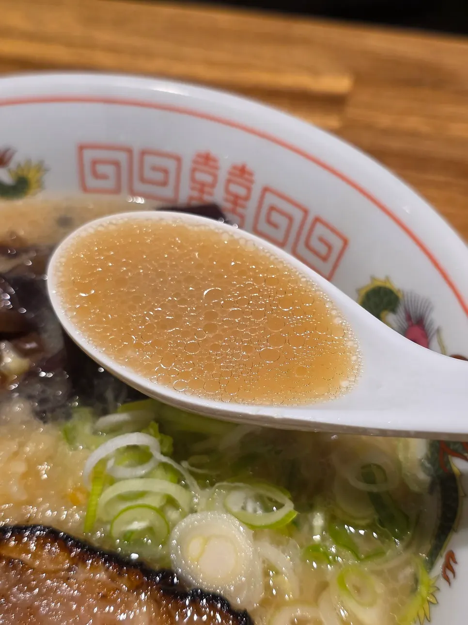 Garlic-forward tonkotsu broth close-up