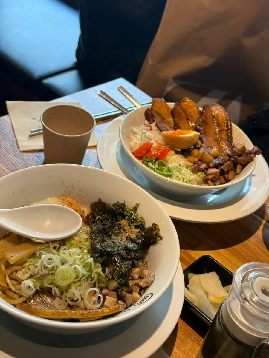 Chashu don and abura soba placed side by side on the table