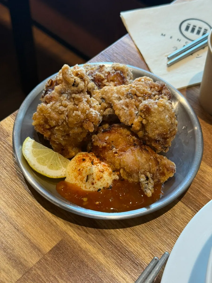 A big spoonful of rice and meat scooped from the chashu don