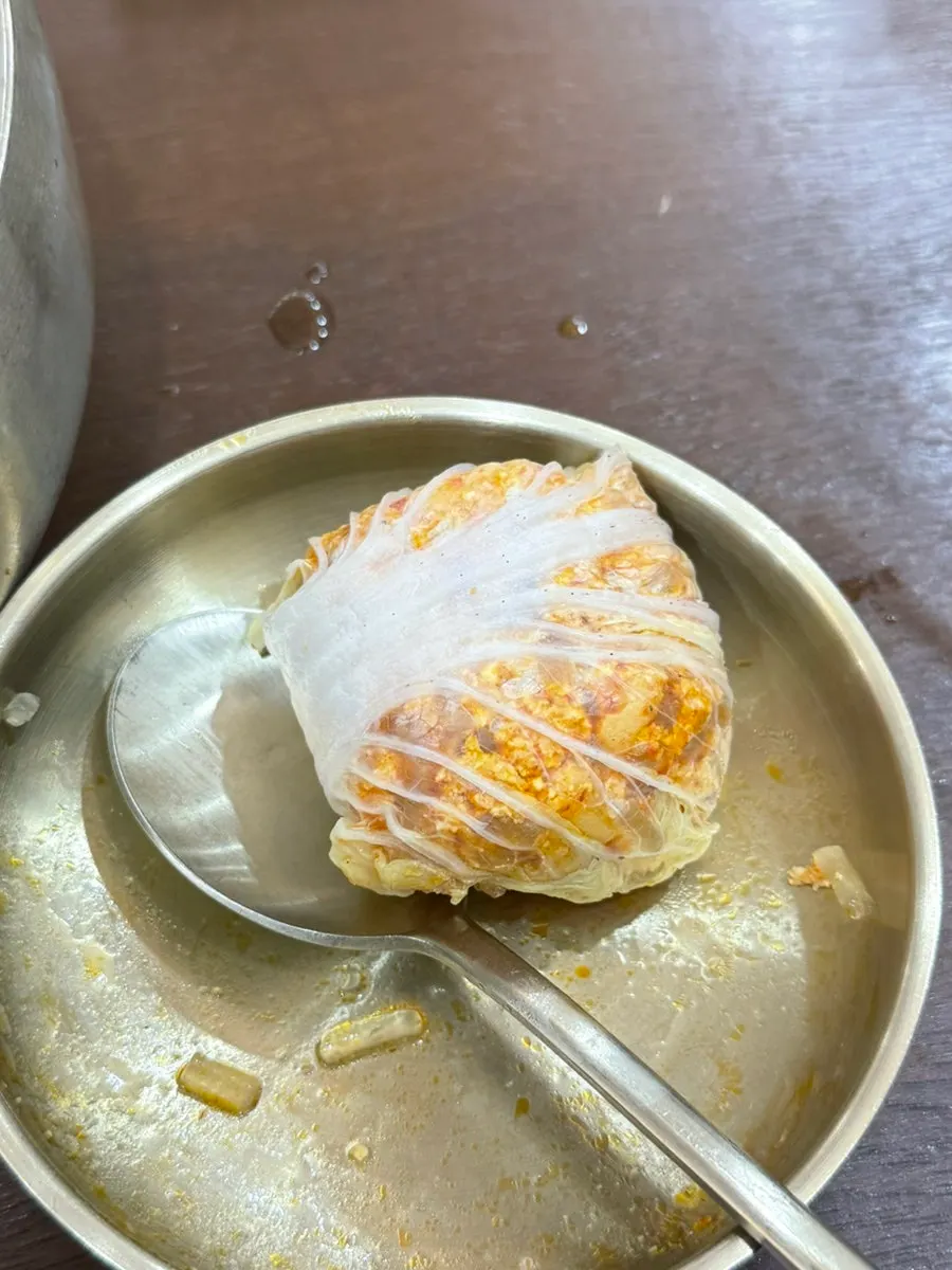Cross-section of a juicy cabbage dumpling