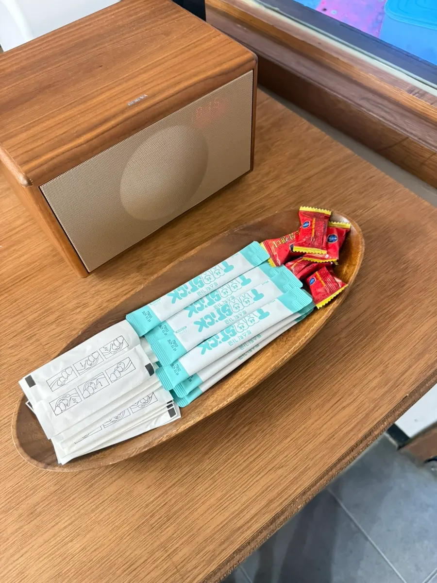 Area stocked with mouthwash and toothpicks