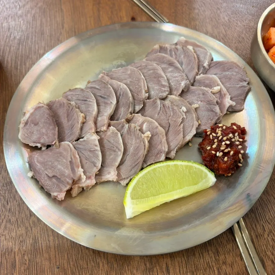 Baekok Myeongdong's cold pork served on a plate