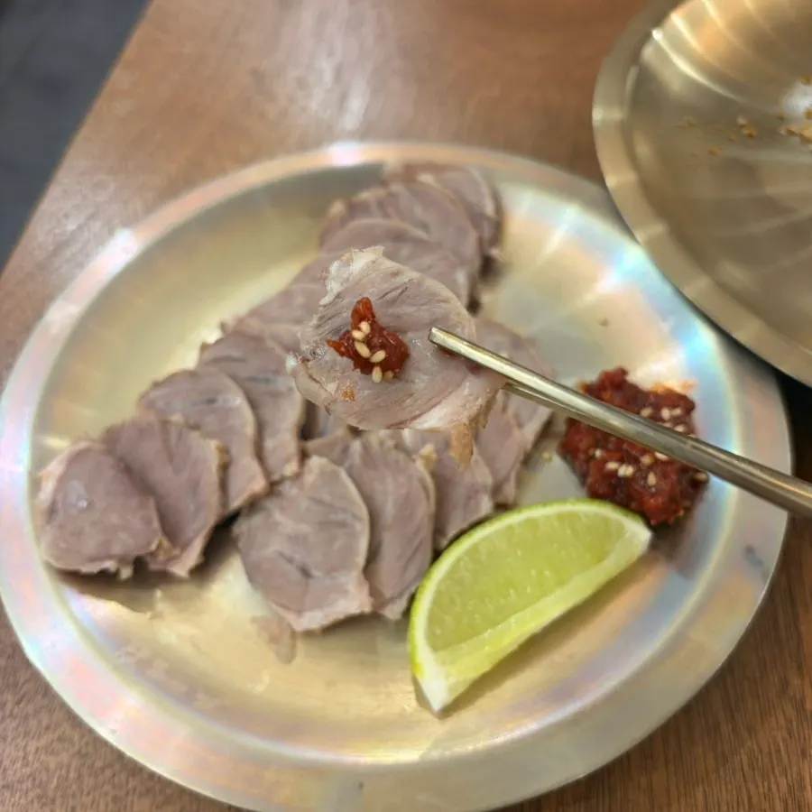 Salted seafood served alongside the cold pork