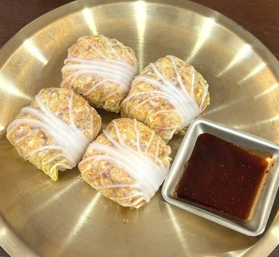 Plate of four cabbage dumplings