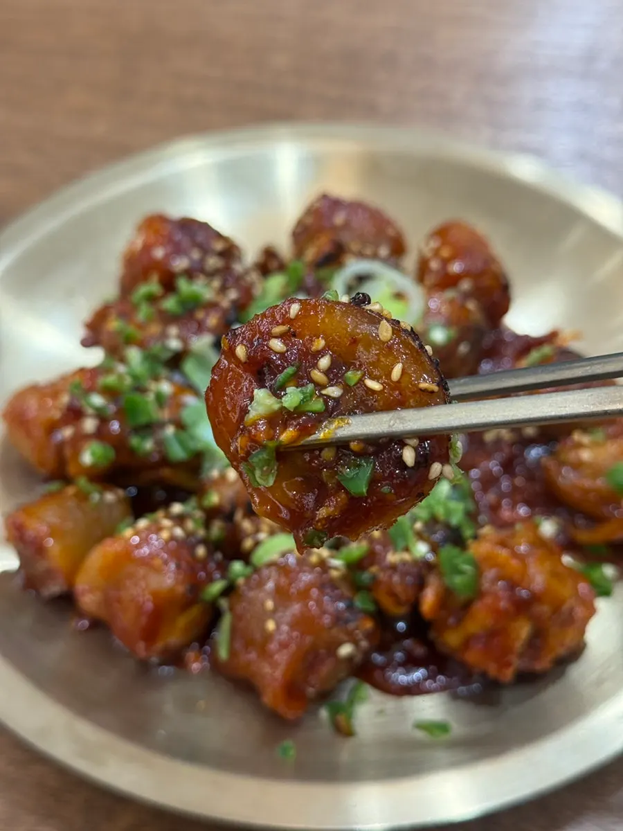 Bulkkorangi, pork tail stir-fried in spicy seasoning