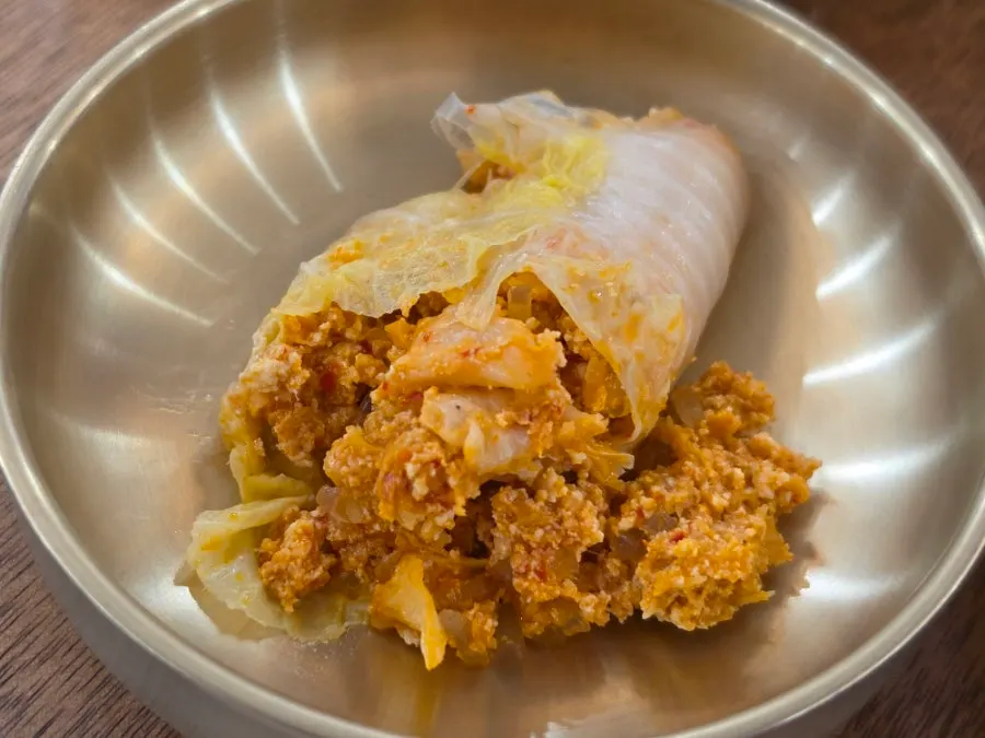 Cabbage dumpling filling packed with meat and kimchi