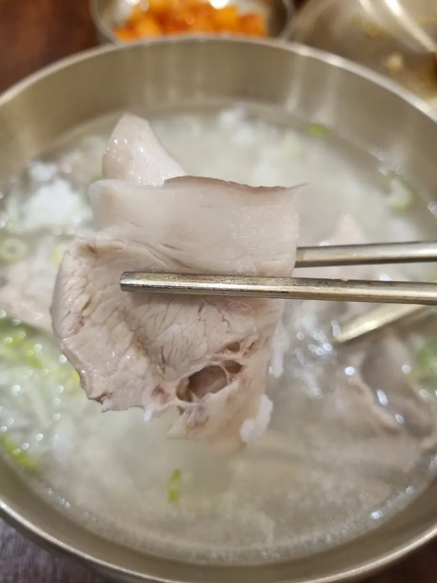 Original pork gomtang with rice soaked toreom-style