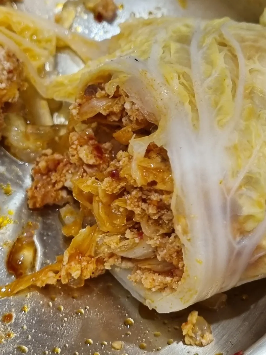 A bite taken out of a cabbage dumpling