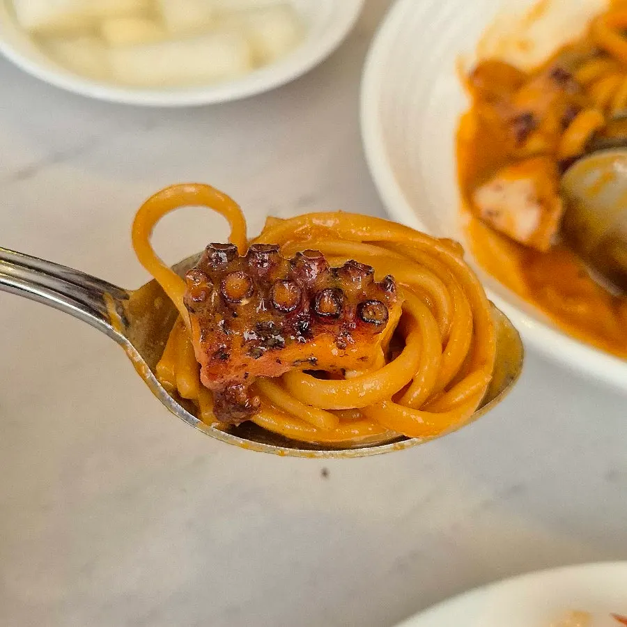 Bisque sauce and wide linguine noodles