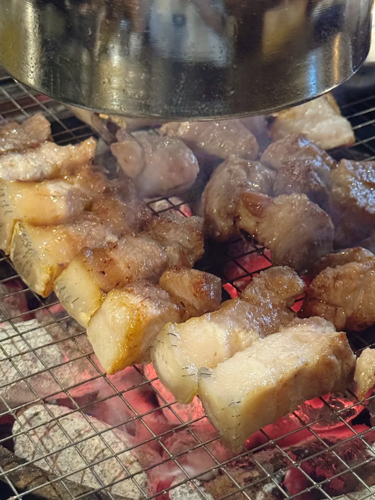 Signature photo of grilled black pork at Yuktongnyeong Myeongdong Main Branch