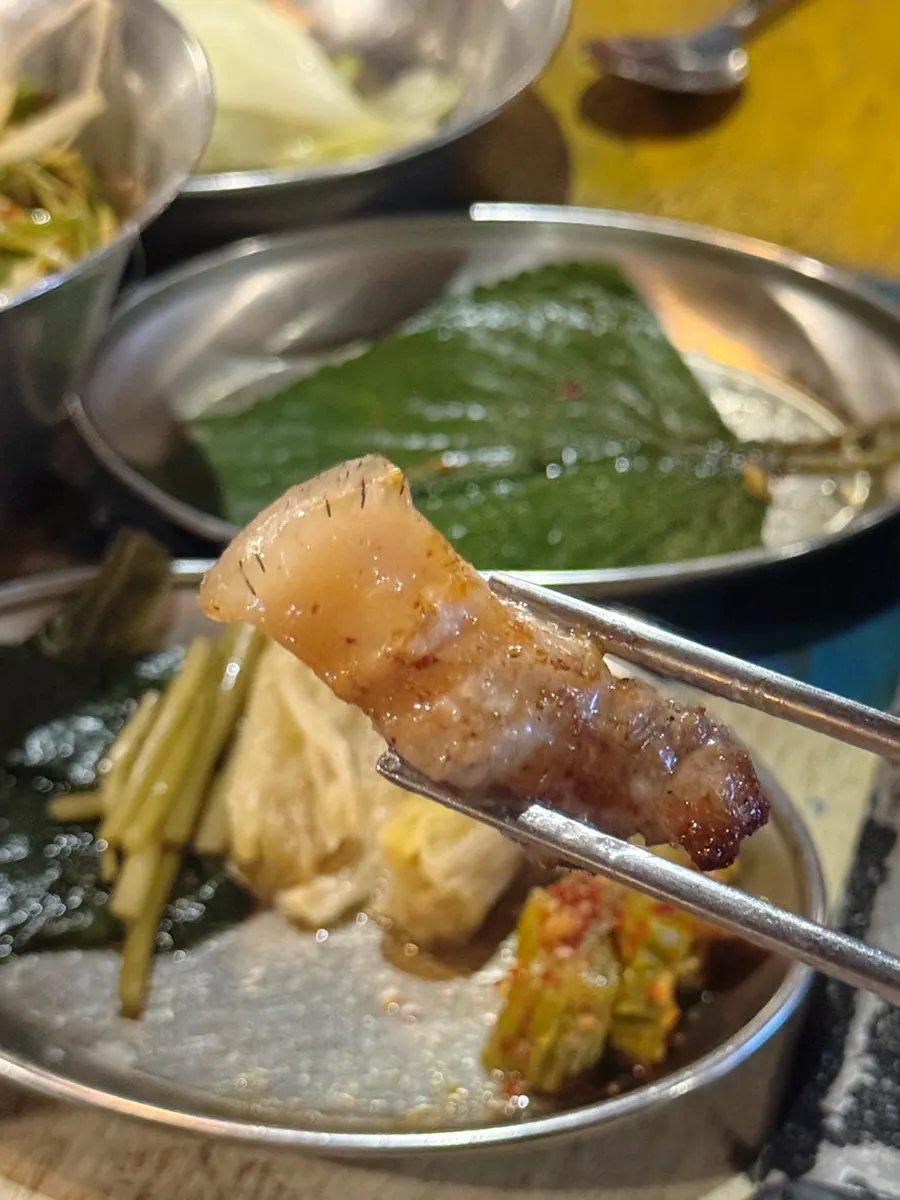 Close-up of the chewy skin on the black pork belly