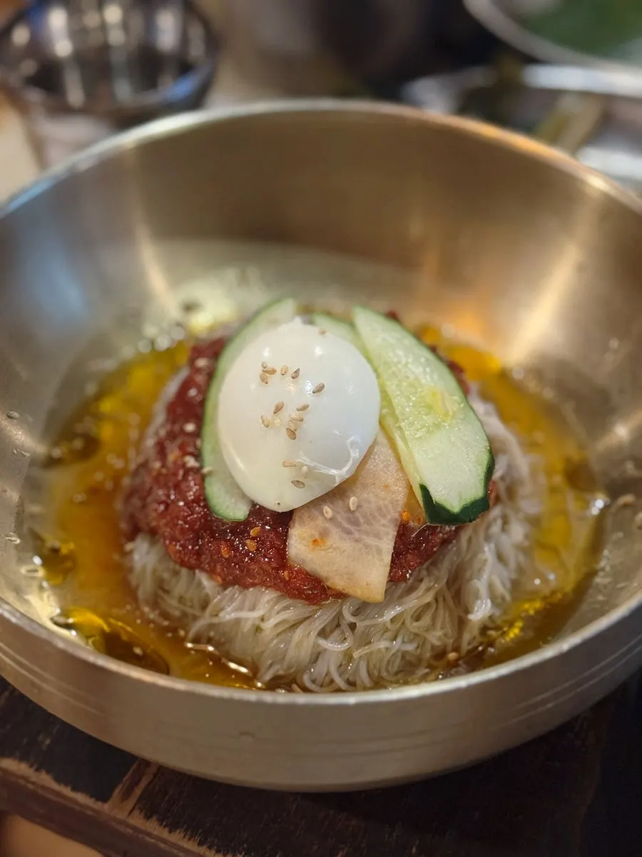 Bibim naengmyeon served with broth on the side