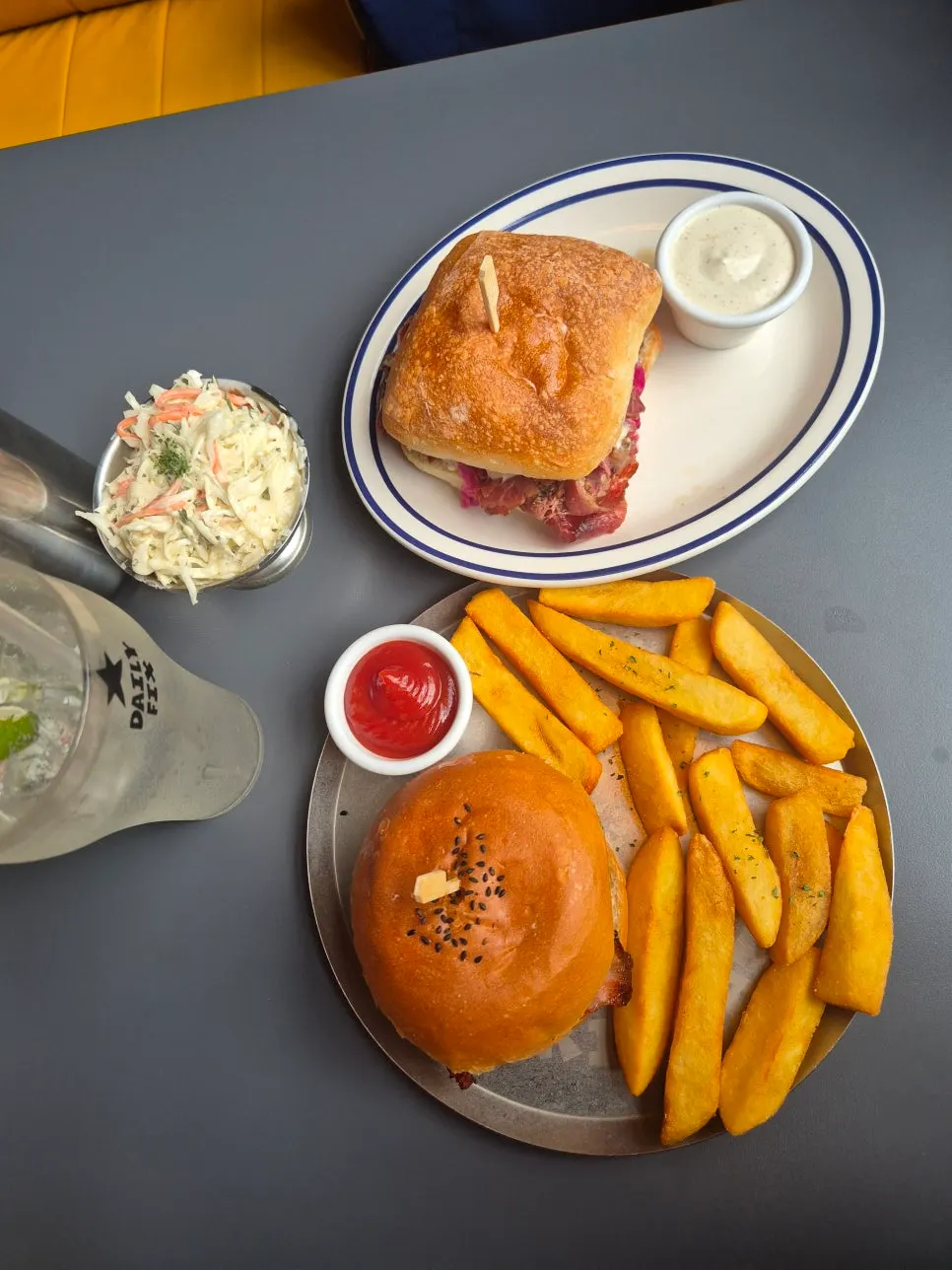 Plate with the pastrami sandwich