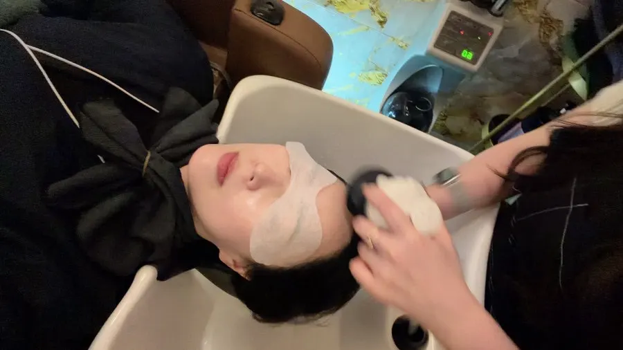 The head spa space where treatment is done lying on a dedicated bed