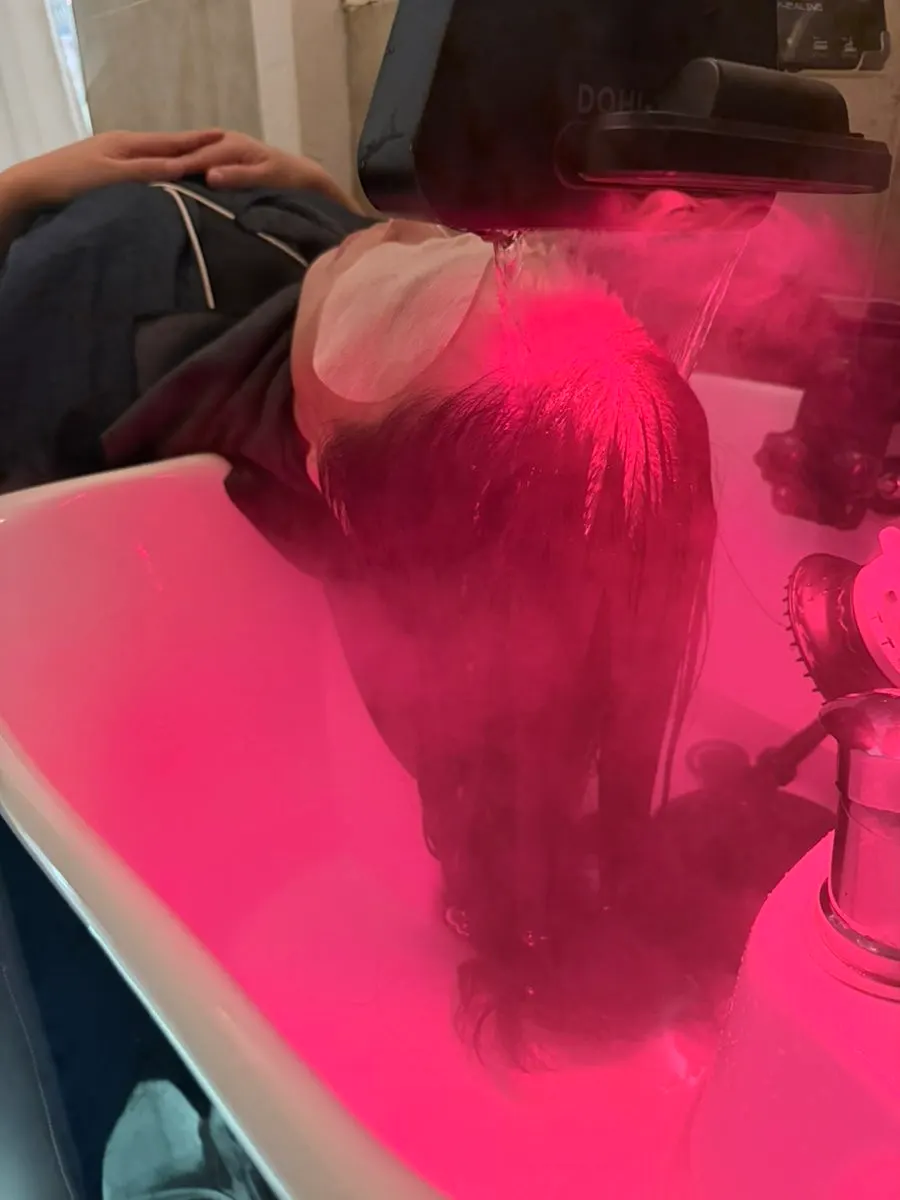 Scalp care scene with red infrared care turned on
