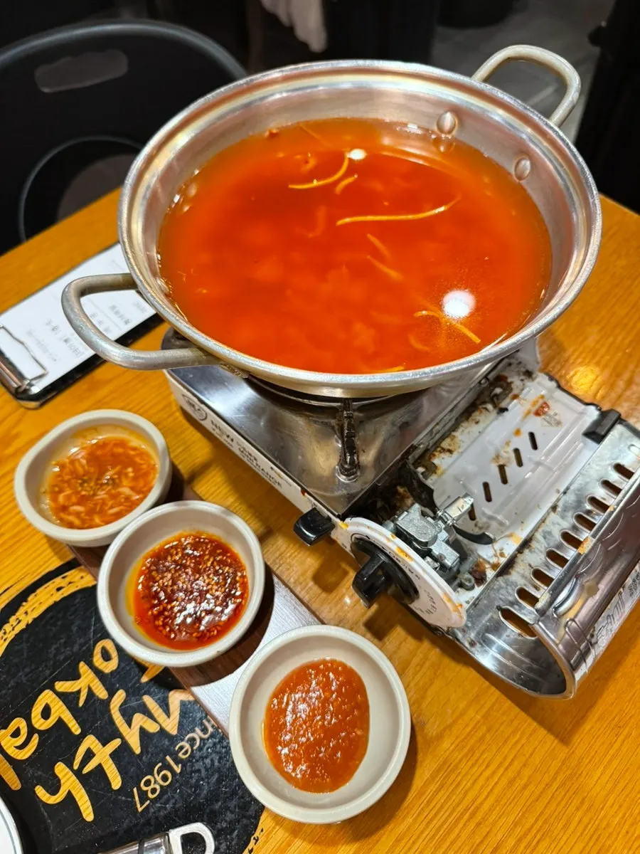 Complimentary spicy kalguksu photo