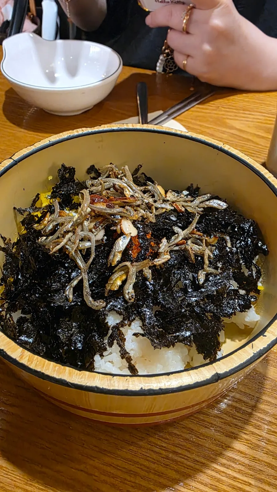 Kimchi kalguksu simmering on a burner