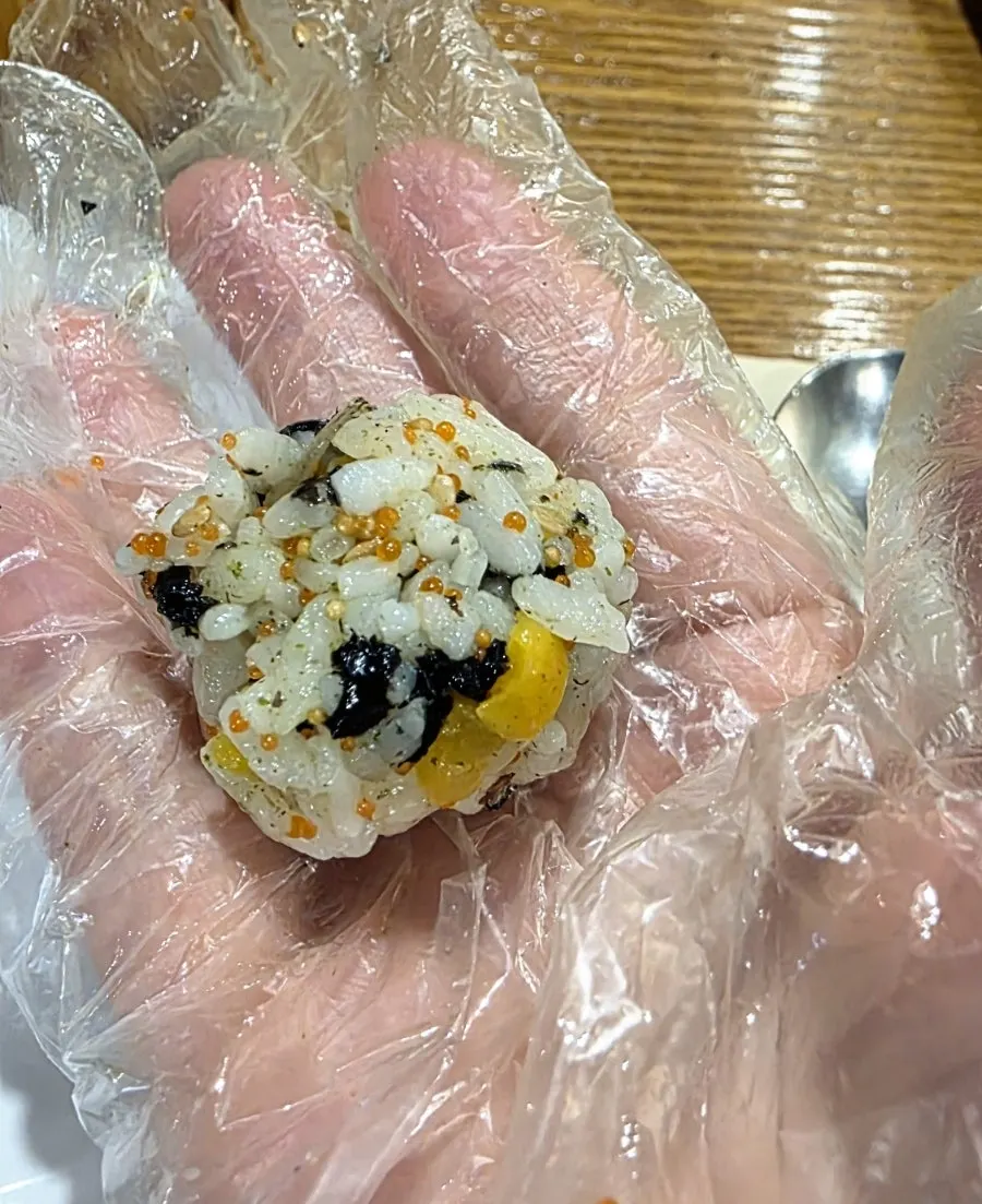 Making anchovy rice balls