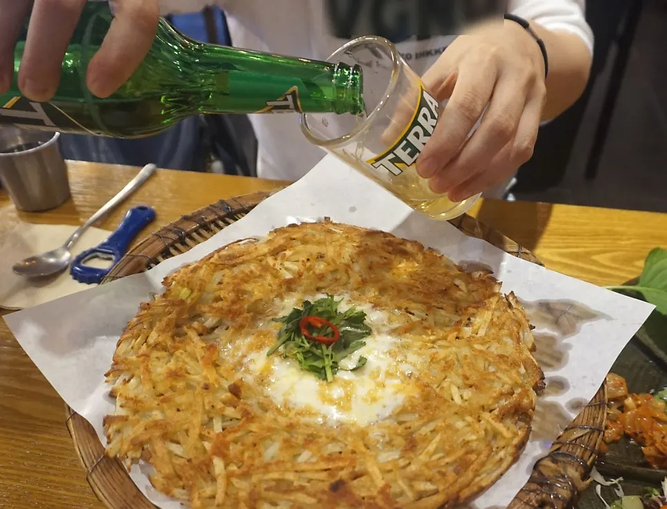 Crisp potato pancake with melted cheese