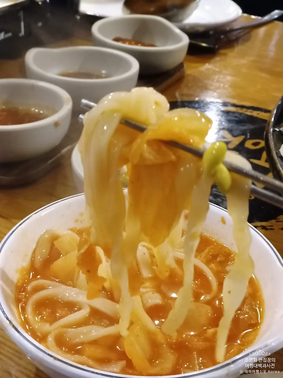 Kimchi soup with kalguksu noodles image
