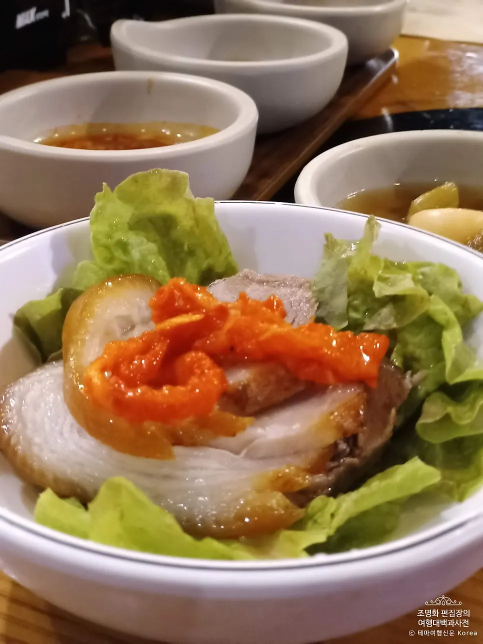 Vertical image in the context of eating jokbal