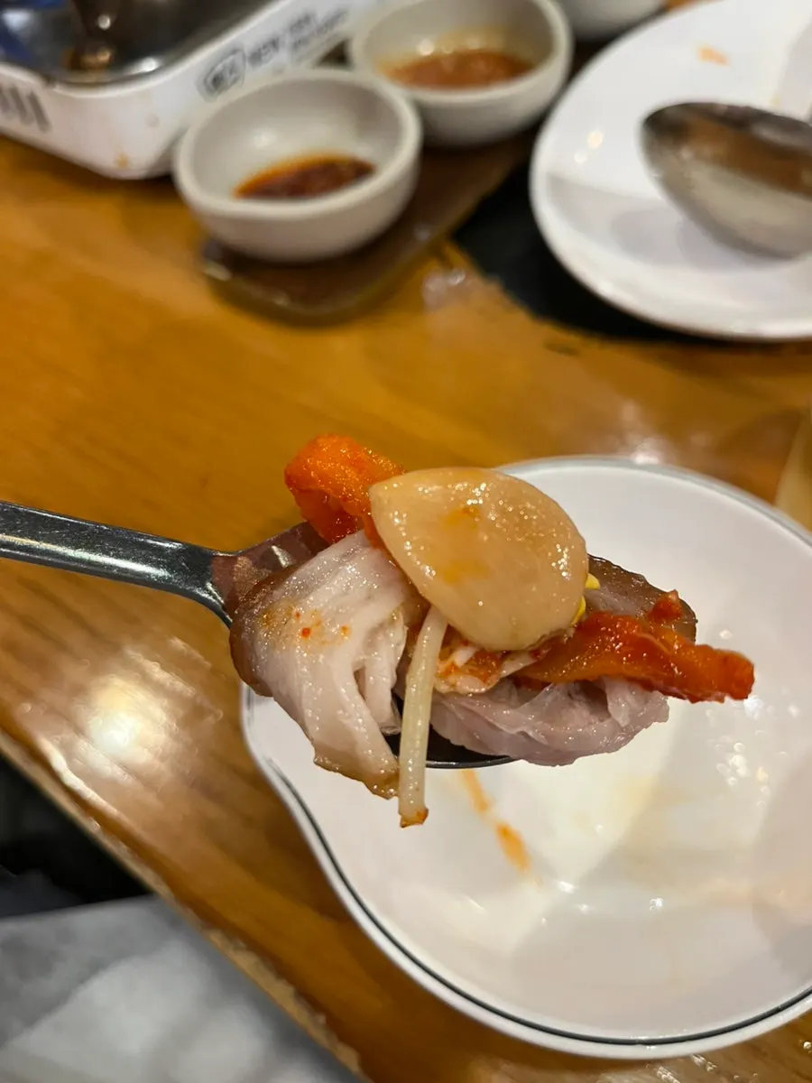 Another bite of the jokbal wrap