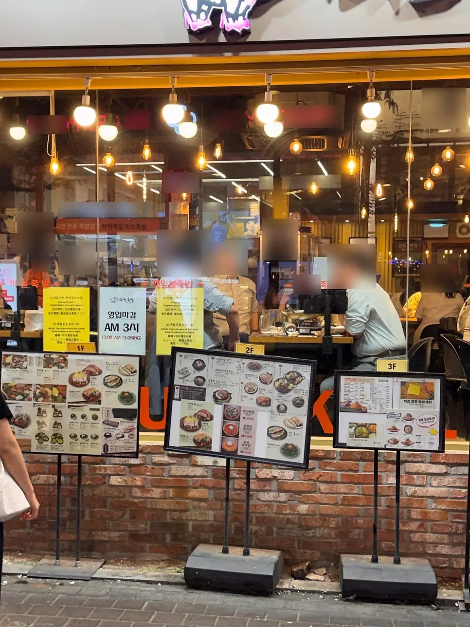 Signboard out front listing the signature menu items