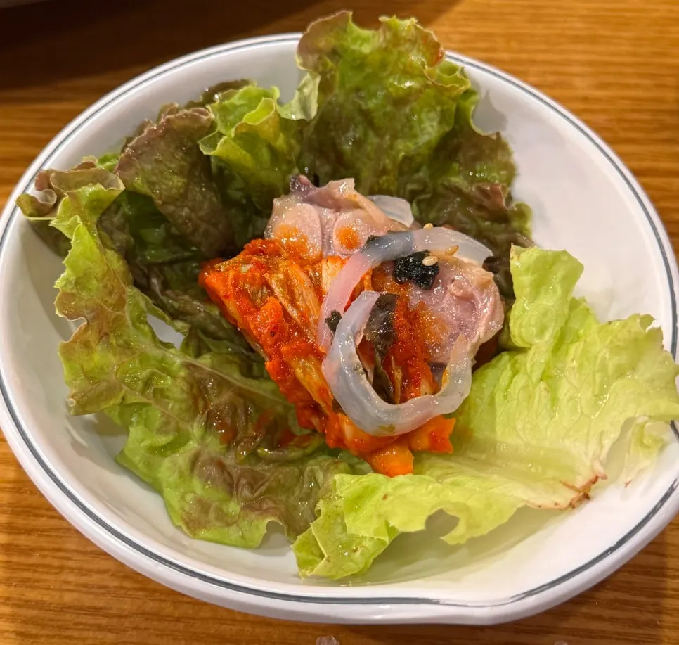 Lettuce wrap with meat, kimchi and jellyfish salad