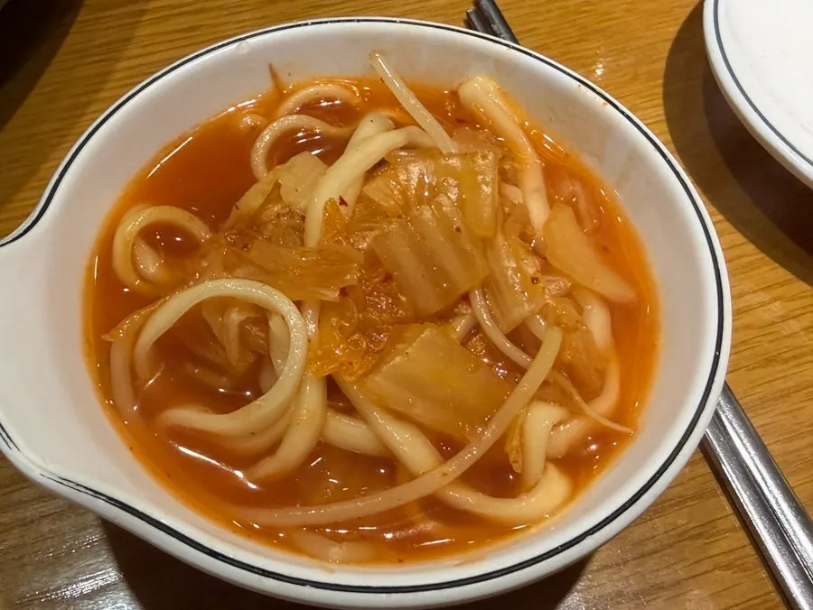 Chewy kalguksu noodles in spicy broth
