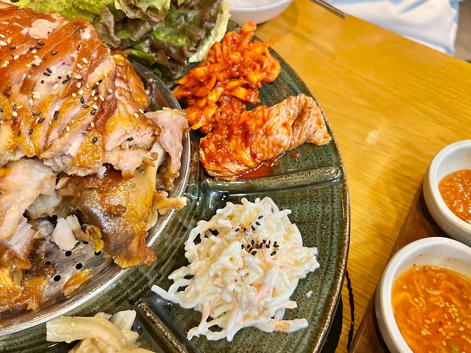 Angel hair radish salad, napa cabbage kimchi, and bossam radish salad