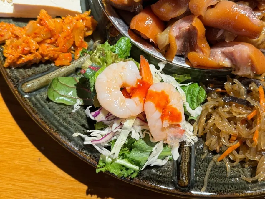 Plate of shrimp salad and tofu