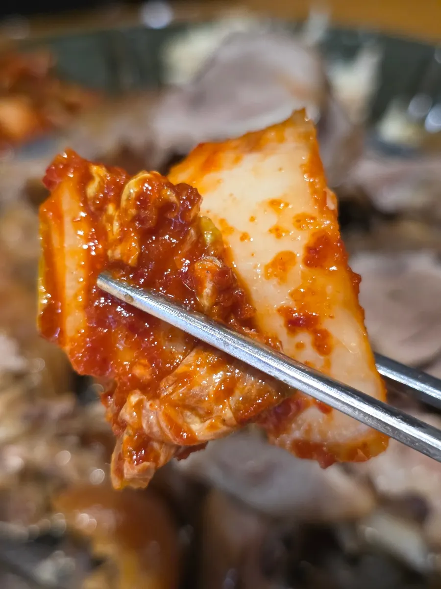 Bossam kimchi served with jokbal