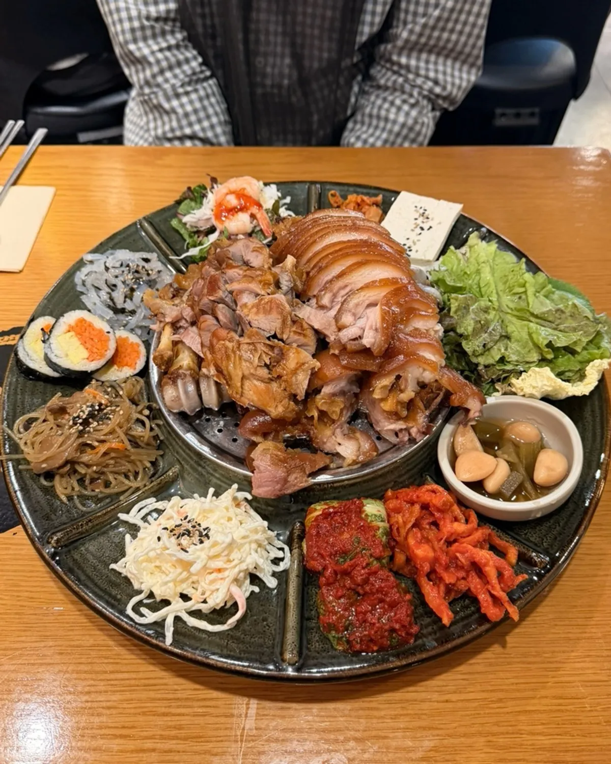 Vertical photo of the full emperor's jokbal spread at Miss Jokbal Seoul Myeongdong Branch