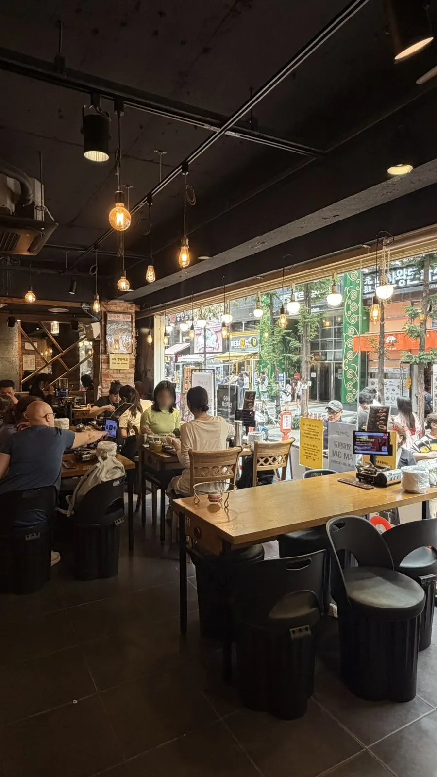 Interior of Miss Jokbal Seoul Myeongdong Branch with a full window wall